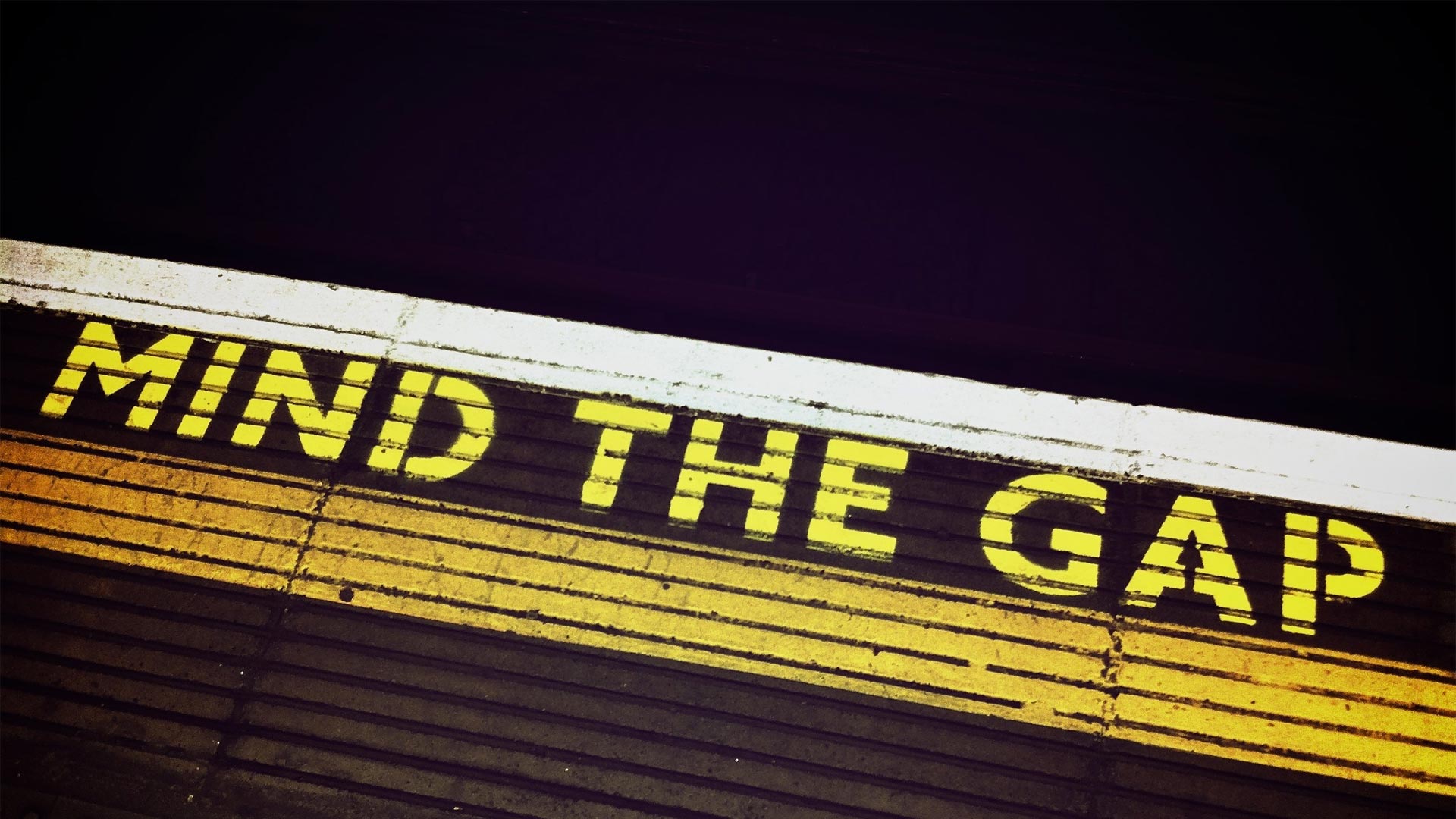 Mind the gap train sign