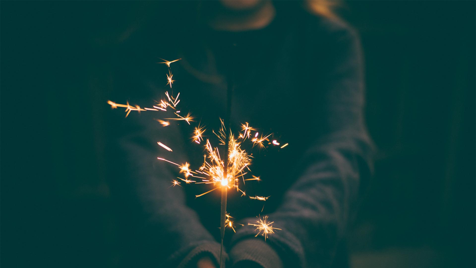 Girl holding sparkler