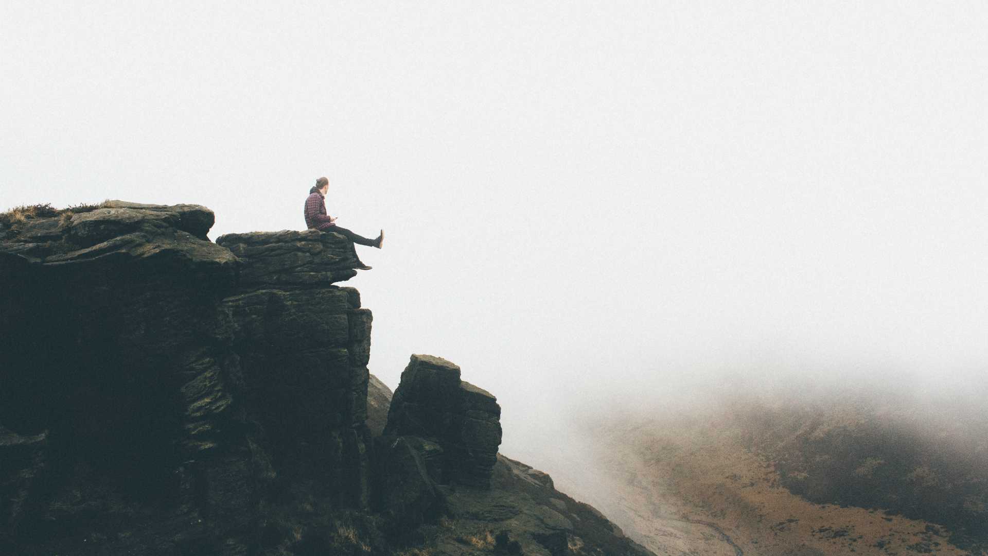 person on the edge of a cliff
