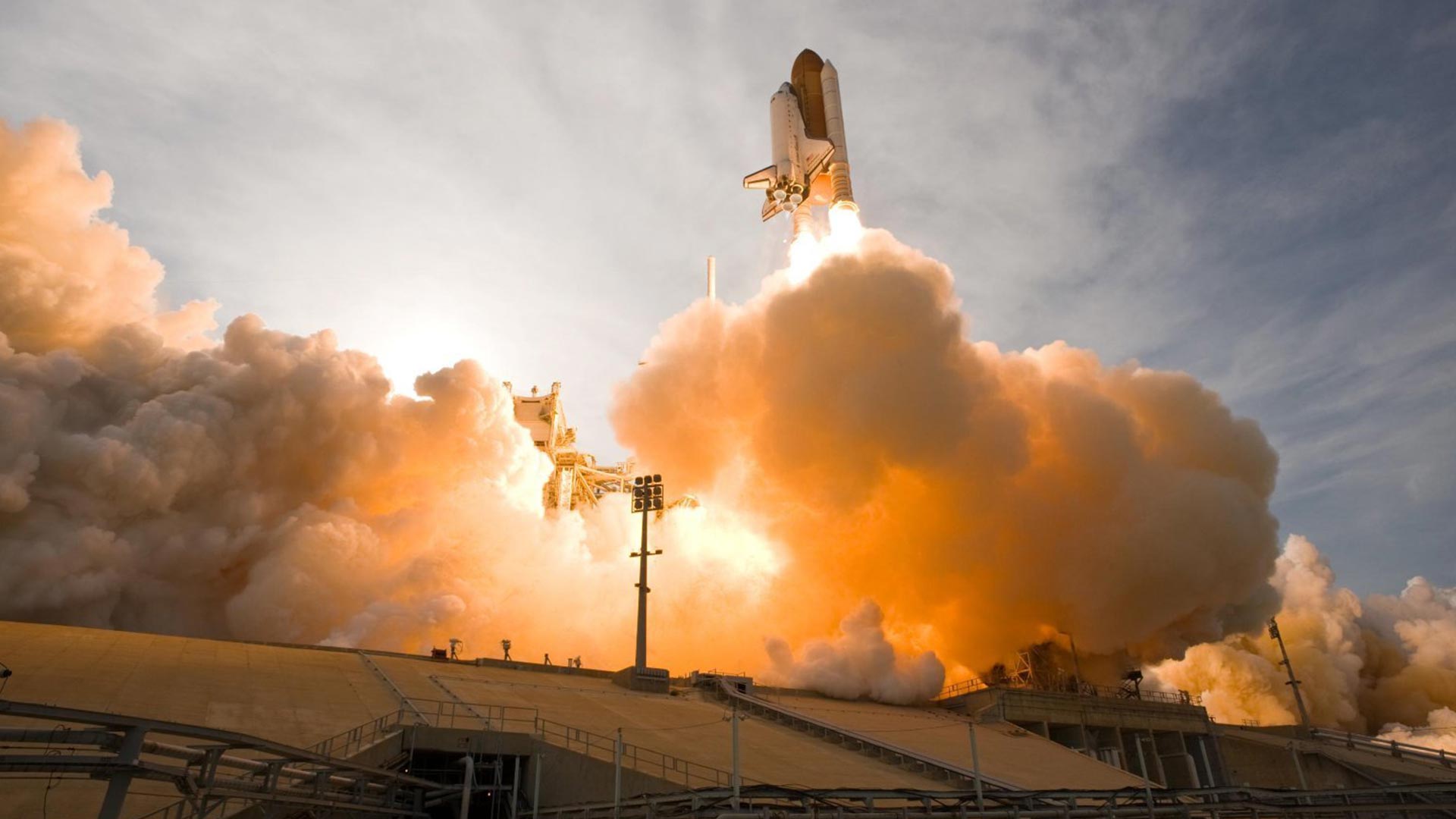 Space shuttle taking off