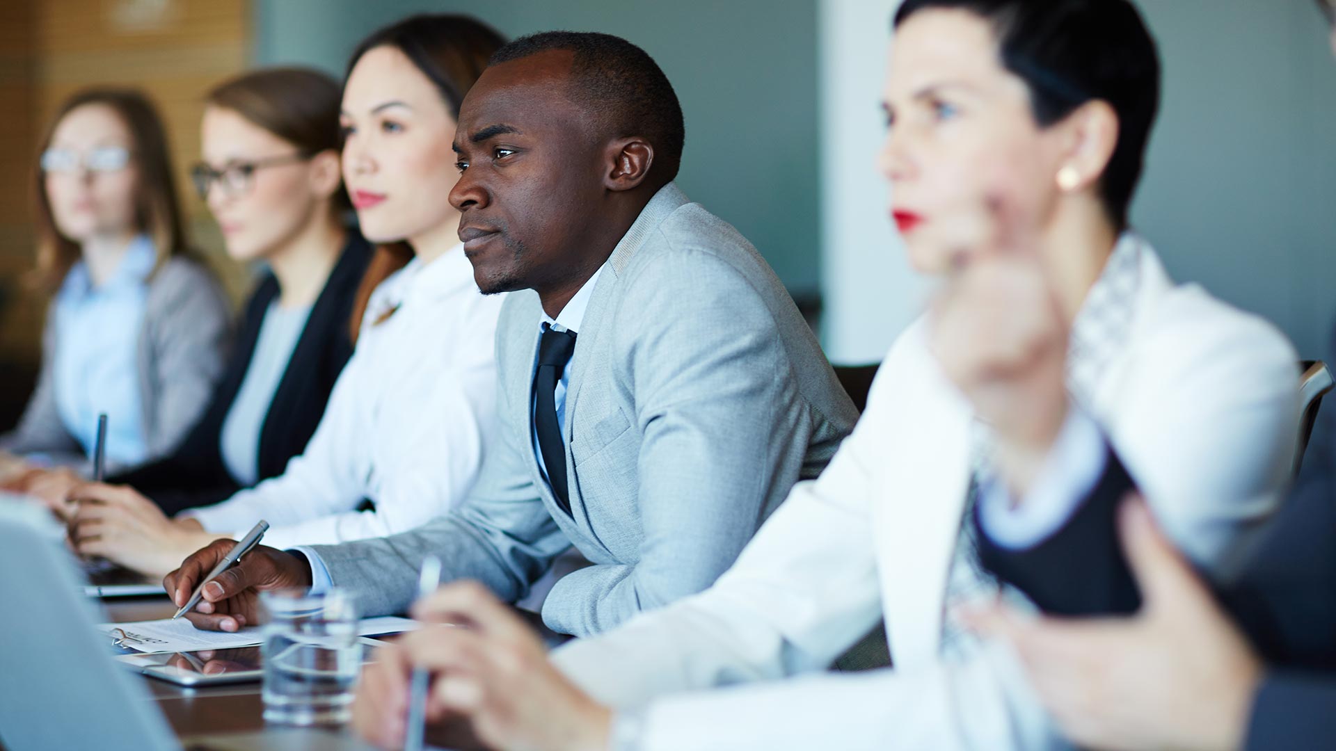coworkers listening during a meeting