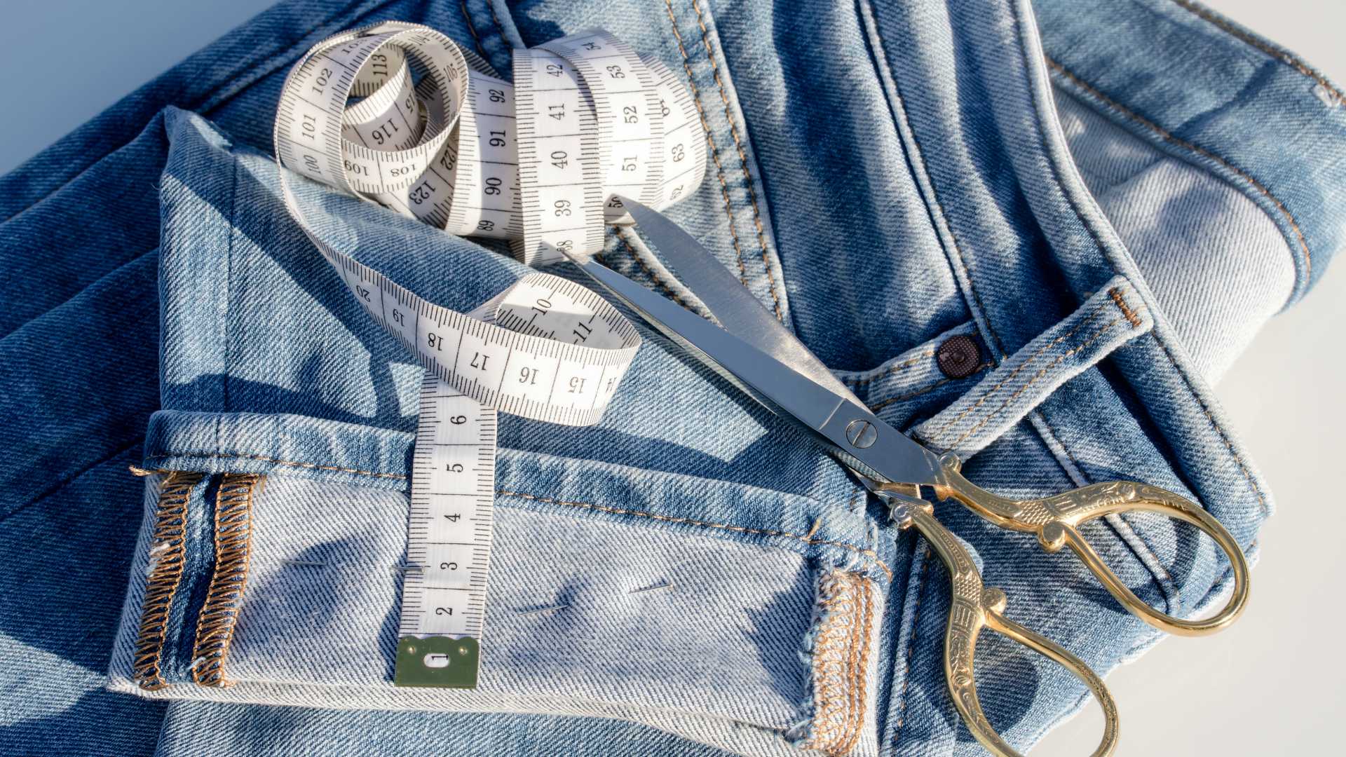 jeans with measuring tape and scissors