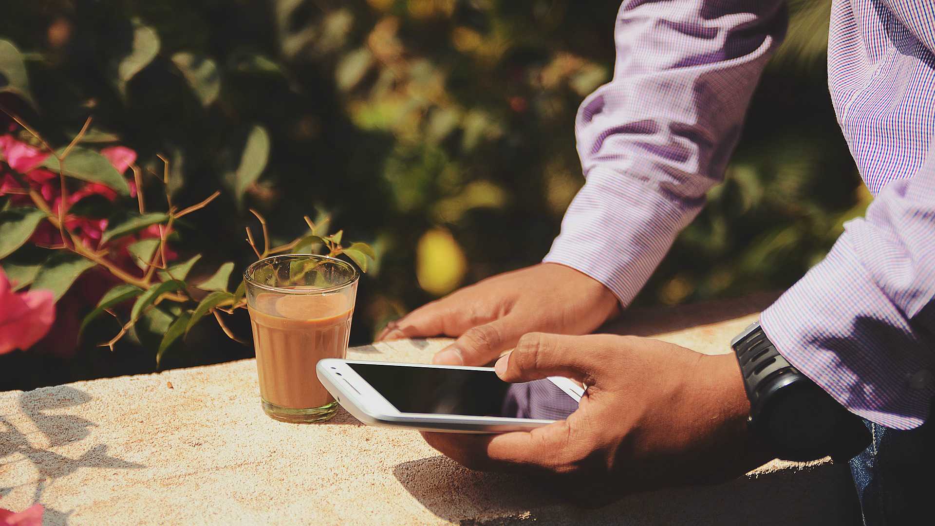 man working on a mobile phone