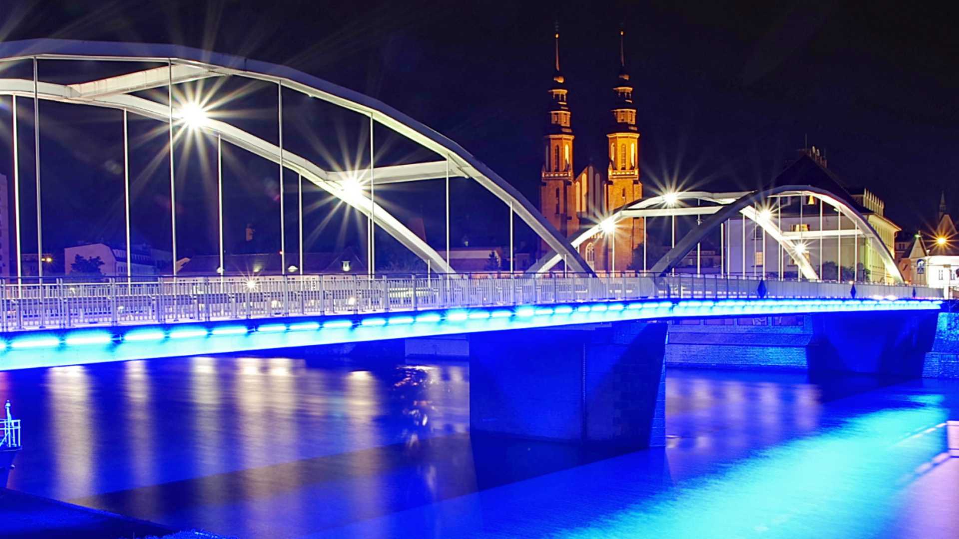 bridge in bright blue at night