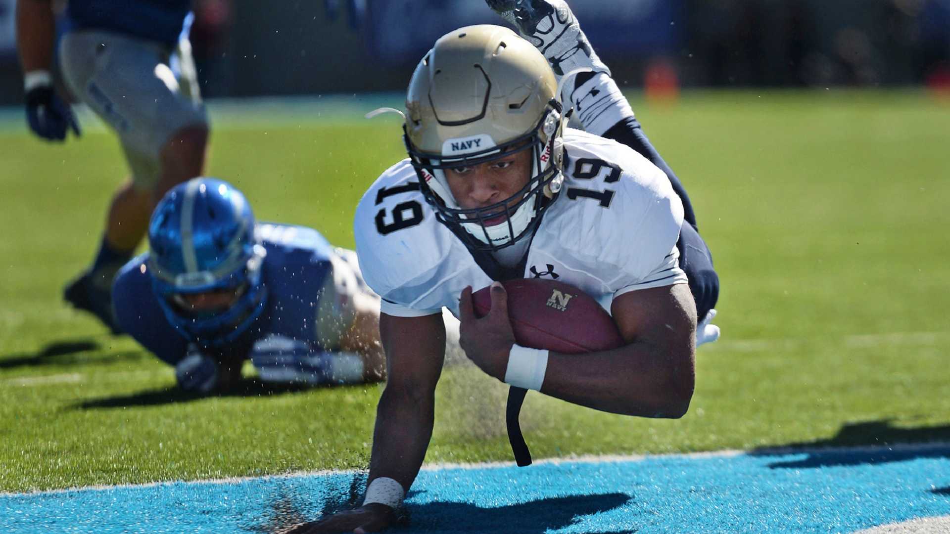 football player scoring a touchdown