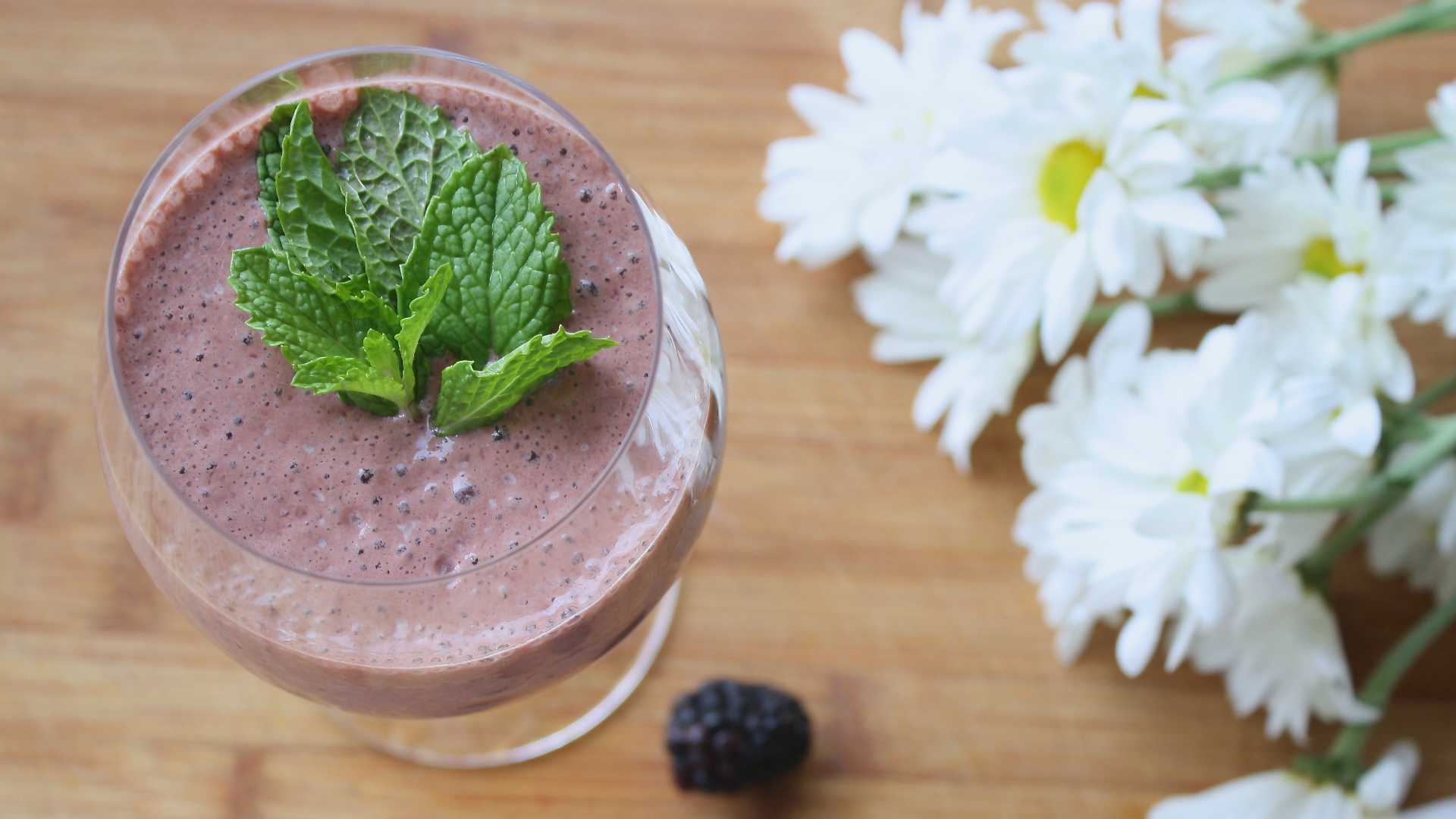 pink smoothie with daisies