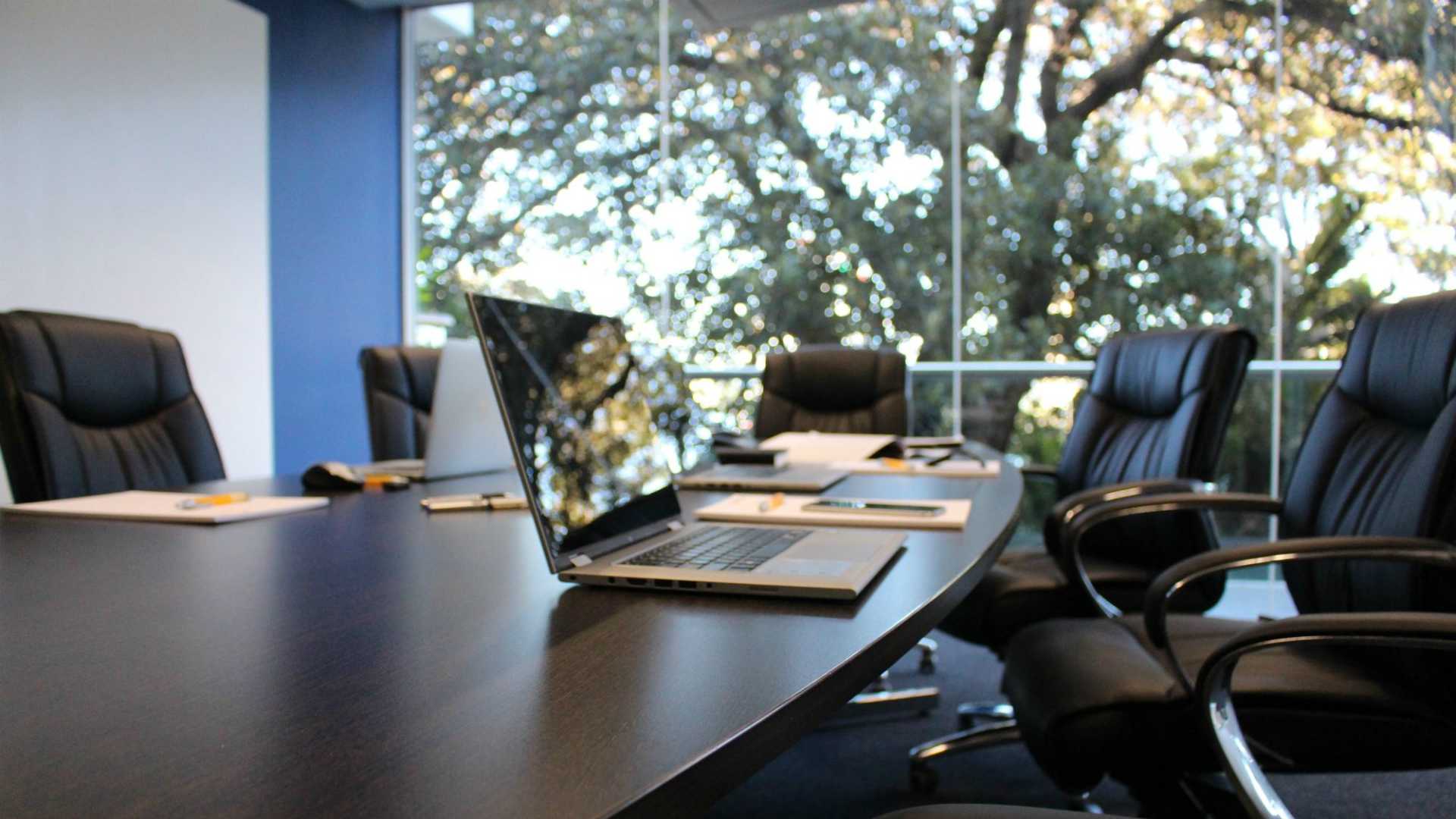 conference room with laptop