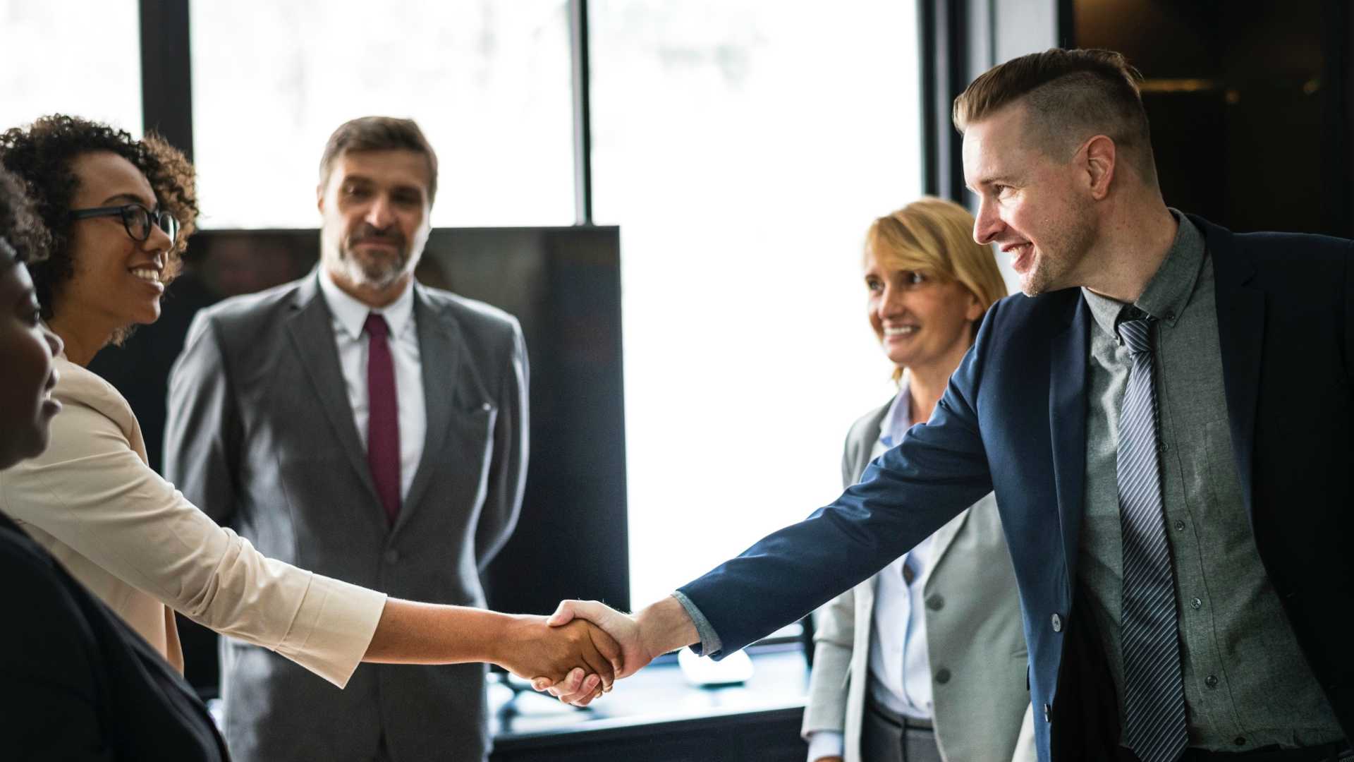 meeting, shaking hands