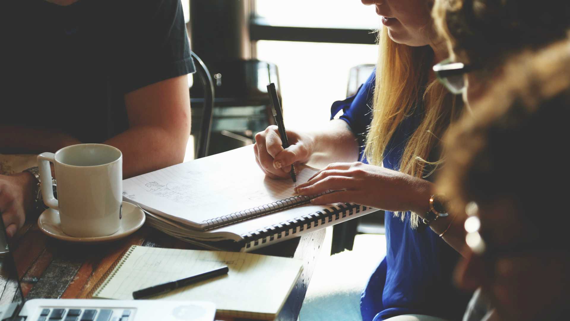 group of young adults working