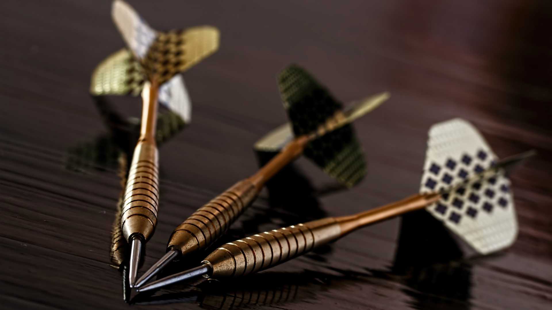 darts pointing in the same direction