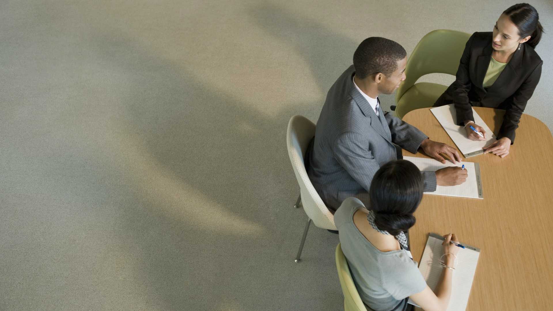 three people meeting