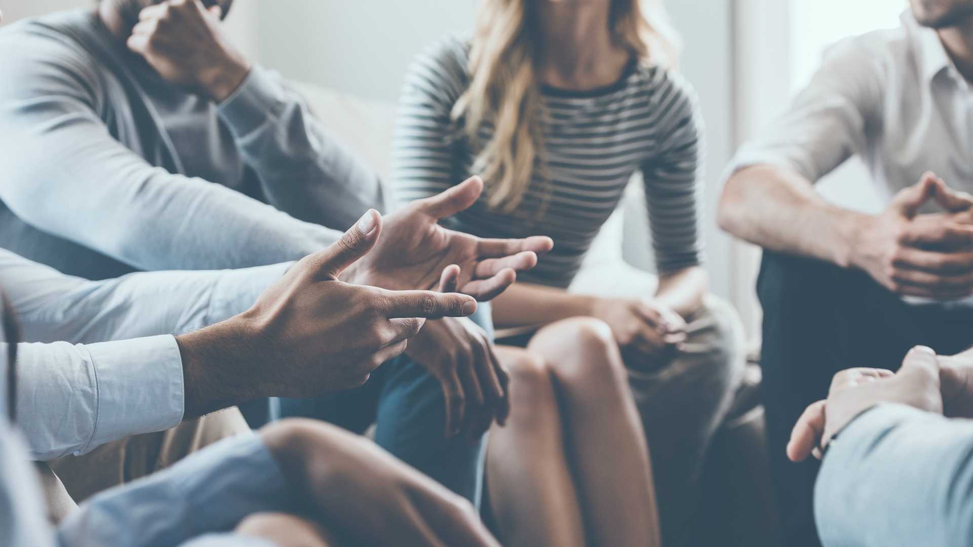 group of professionals having a discussion
