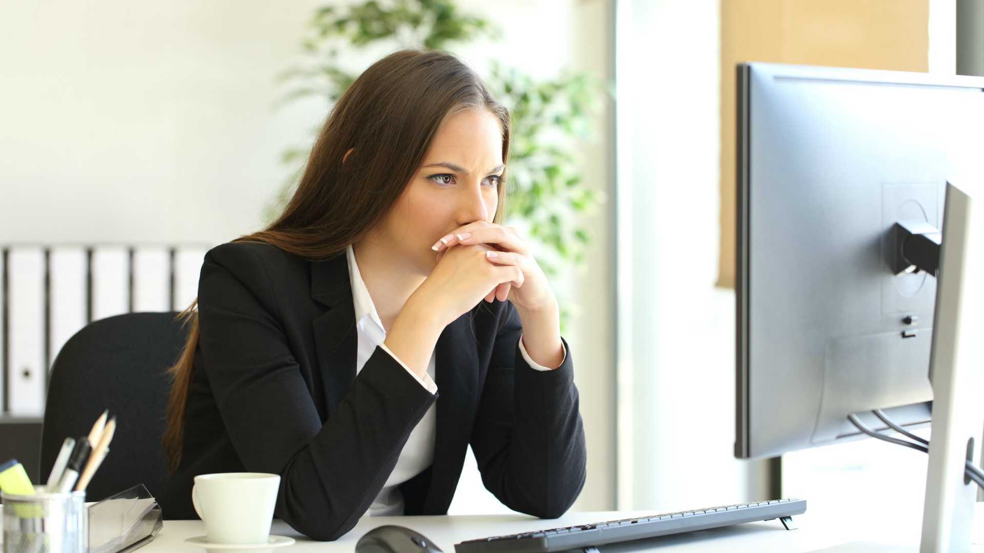Businesswoman solving a difficult assignment