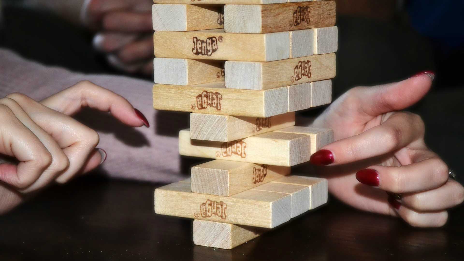 woman playing jenga