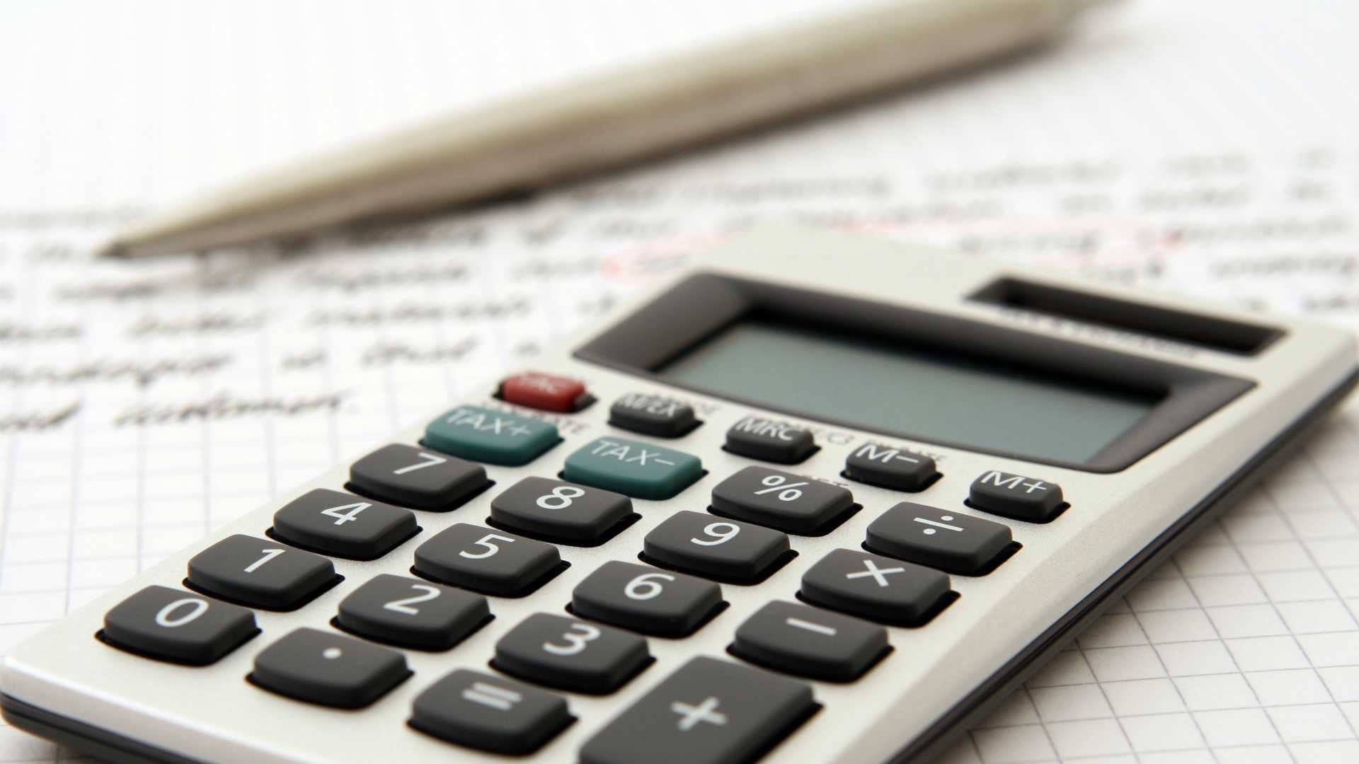 budget, calculator and pen