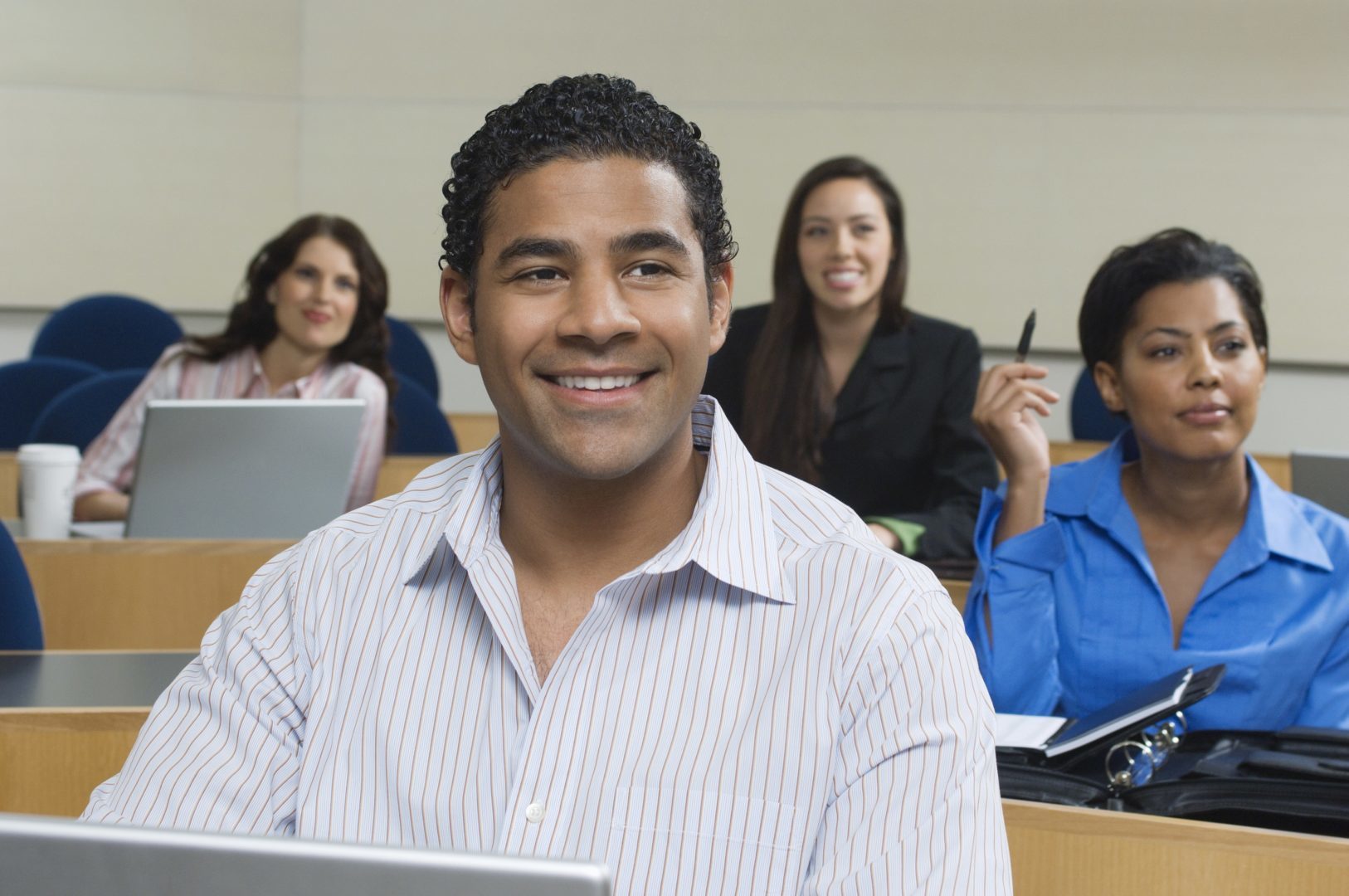 Business people sitting in classroom