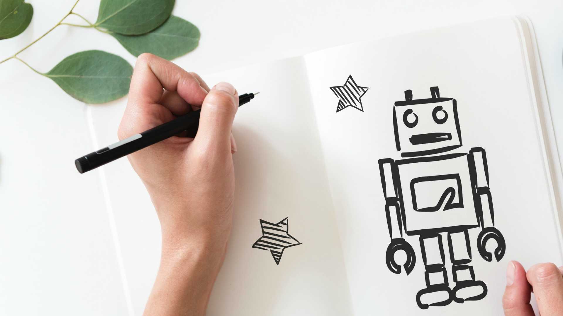 person drawing a robot