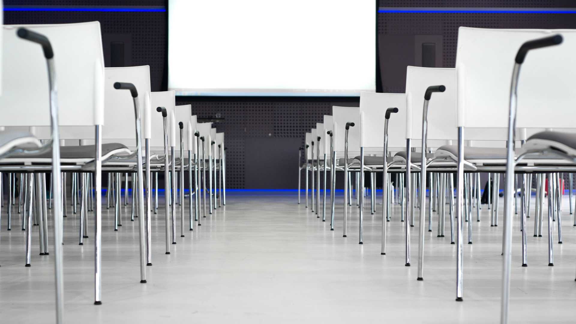 conference room with dry erase board and chairs