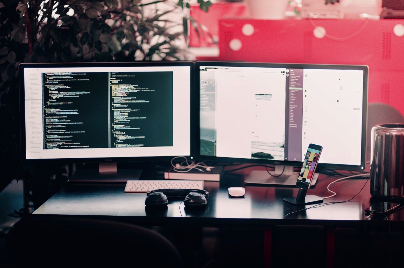 computer with two monitors with code