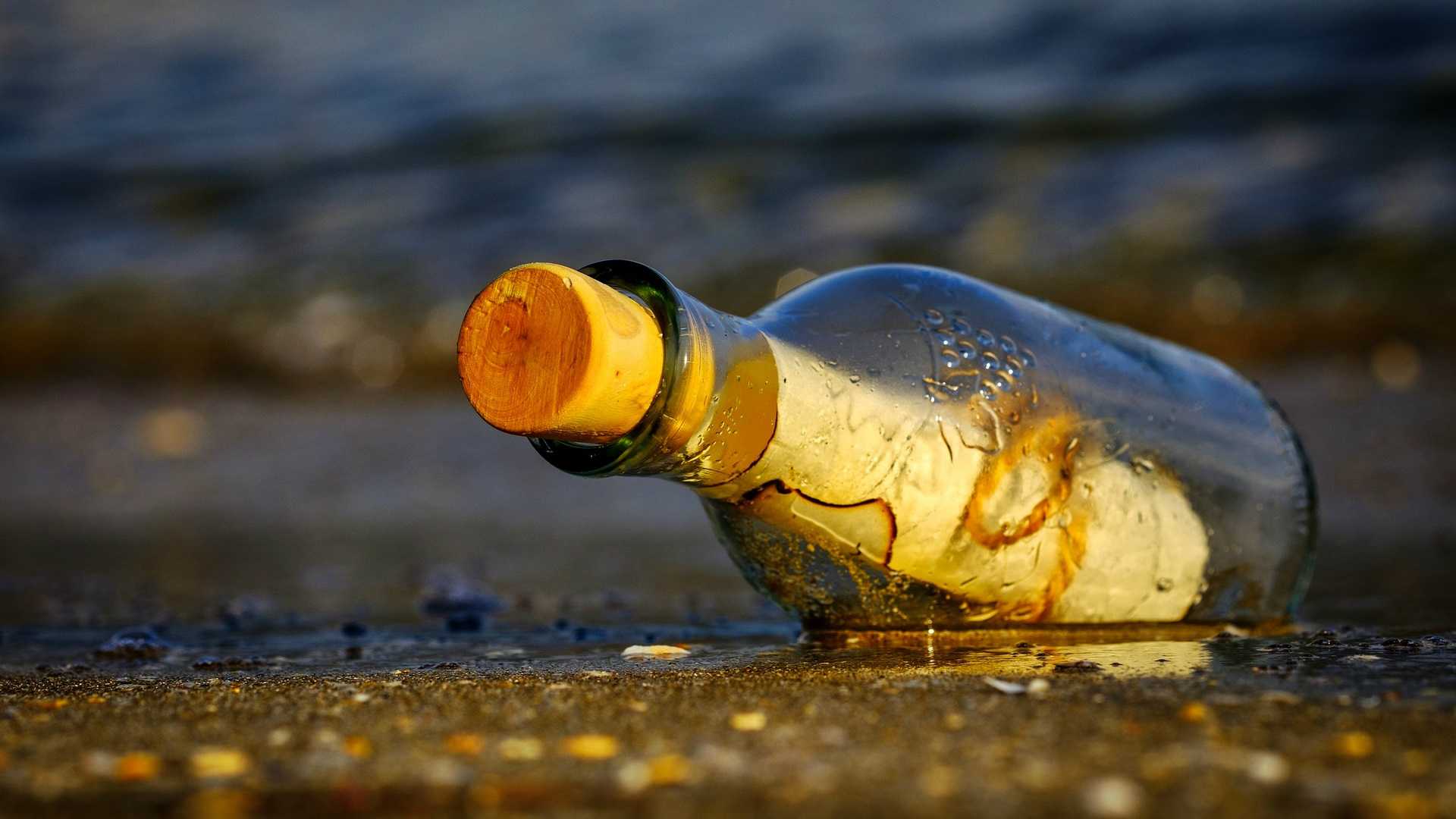 message in a bottle on the beach
