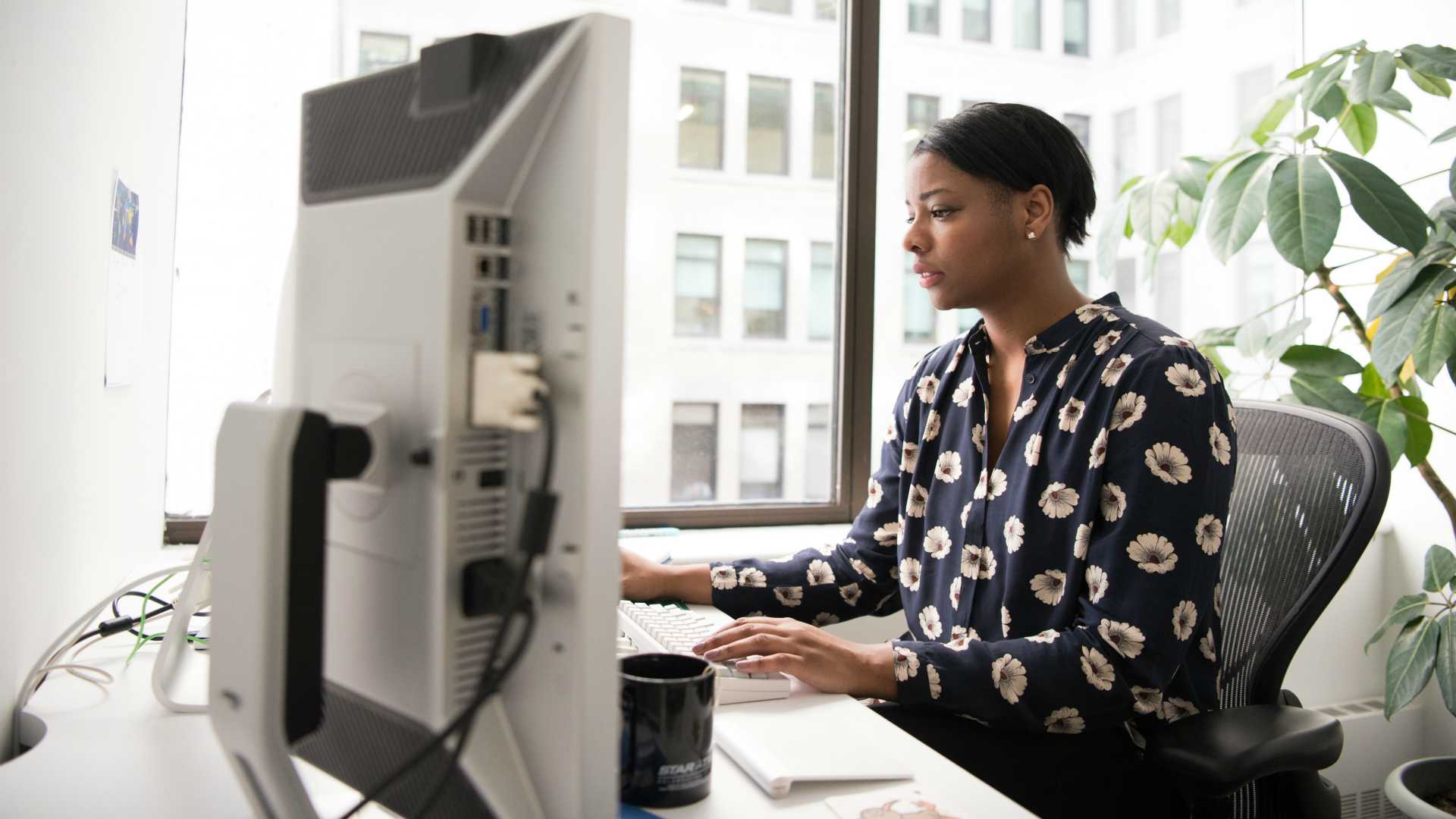 woman working on a computer