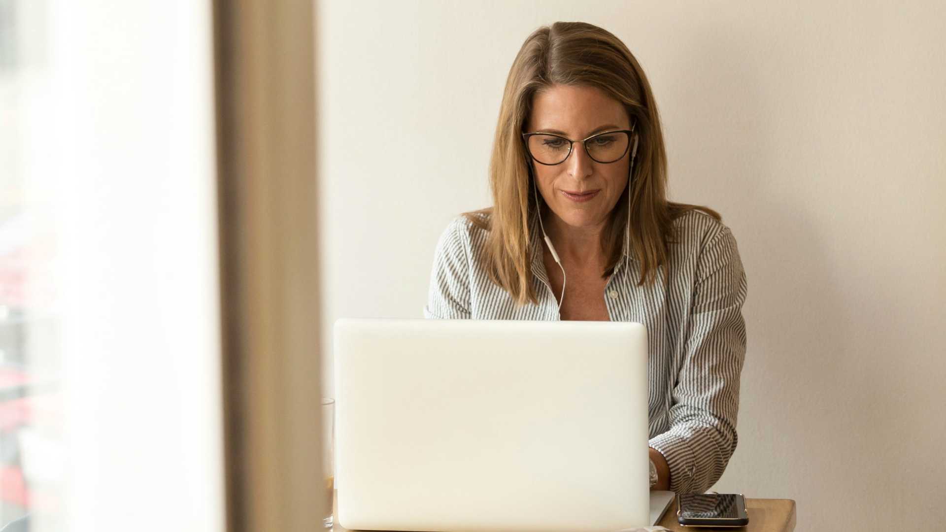 leader working on a laptop