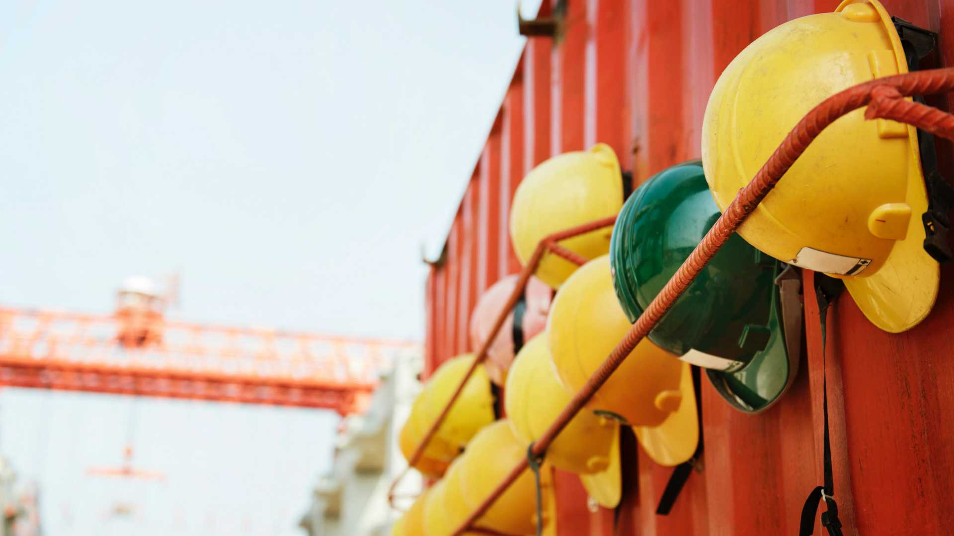hard hats on a wall