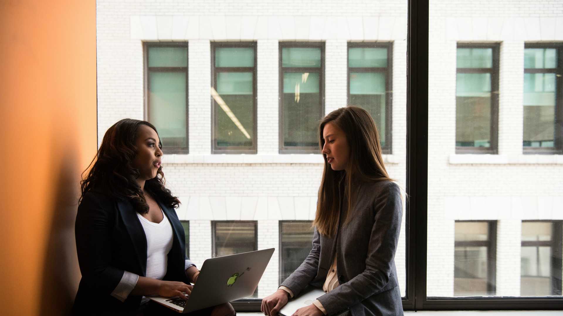two women in a meeting