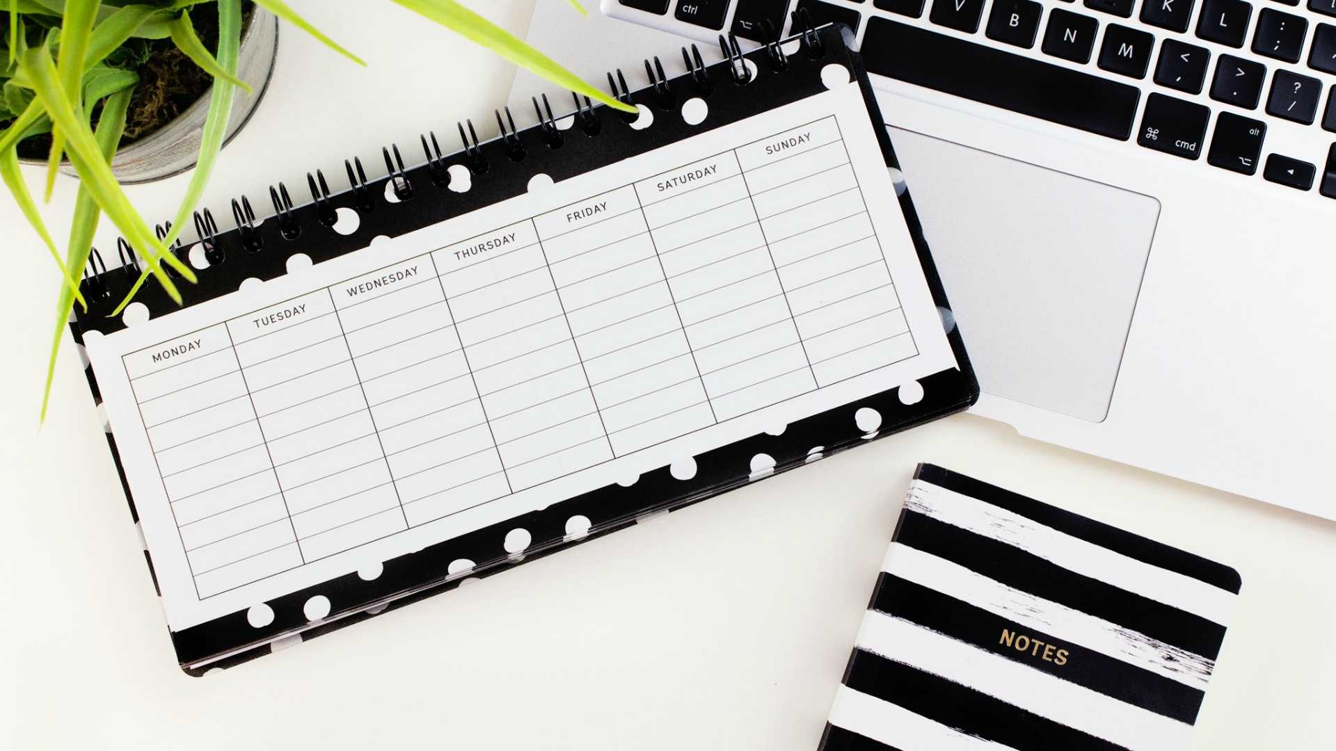 laptop, planner and notebook