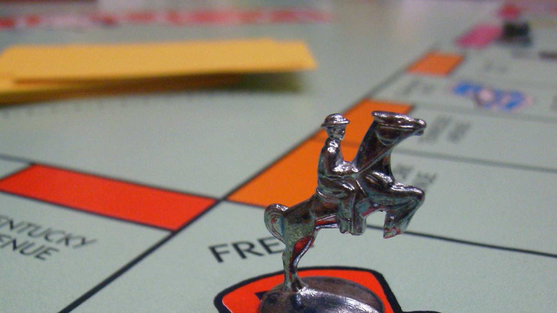 Monopoly piece on board