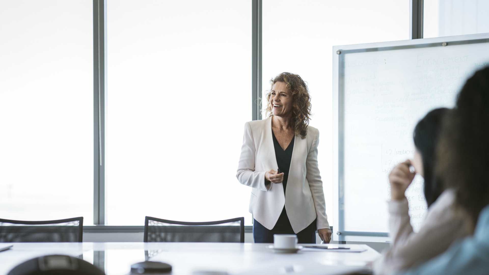 woman giving a presentation in a meeting