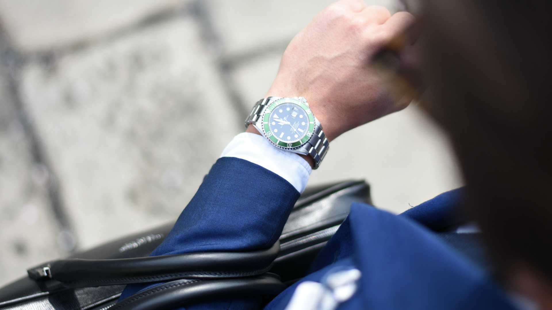 businessman checking his watch