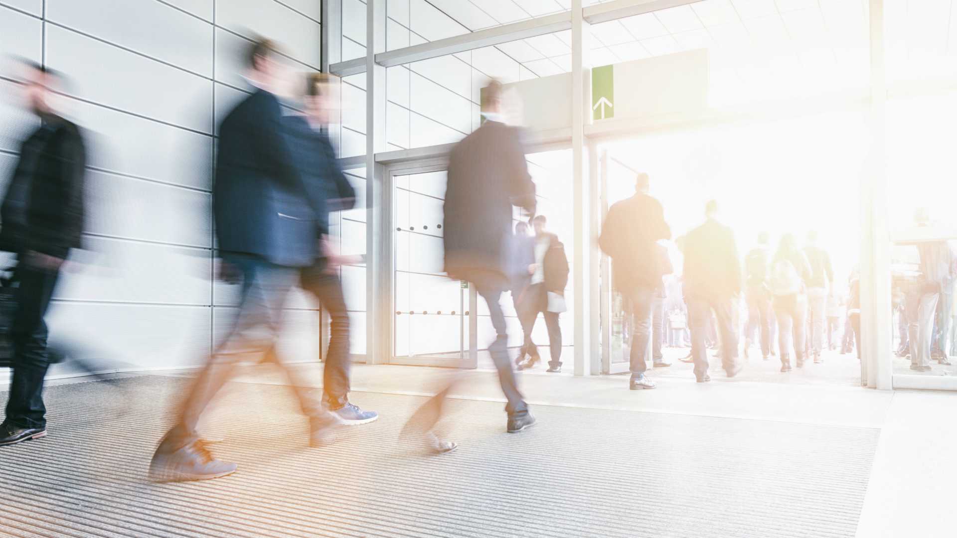 crowd of business people rushing in a entrance