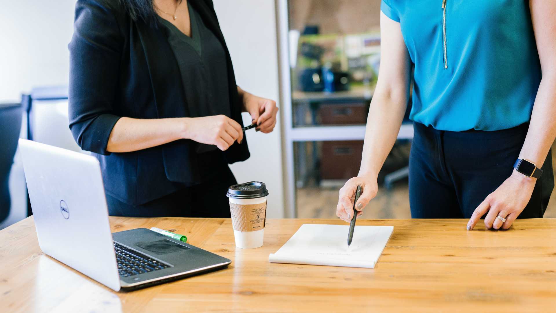 woman giving direction to her employee