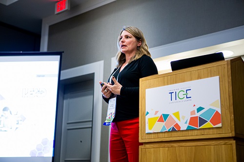 Marjorie Van Roon, CPTM, giving her presentation at TICE