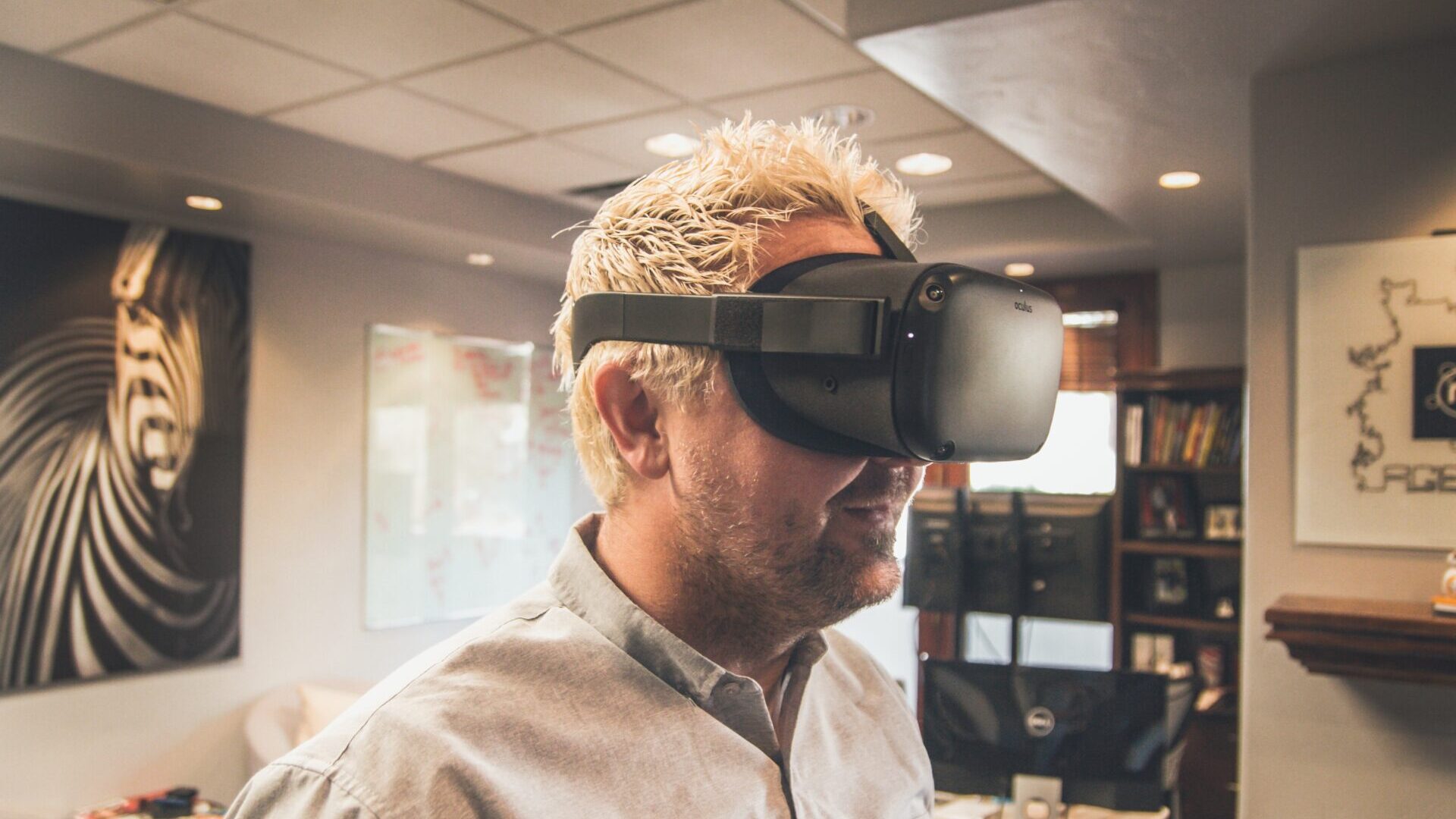 Caucasian man wearing virtual reality goggles