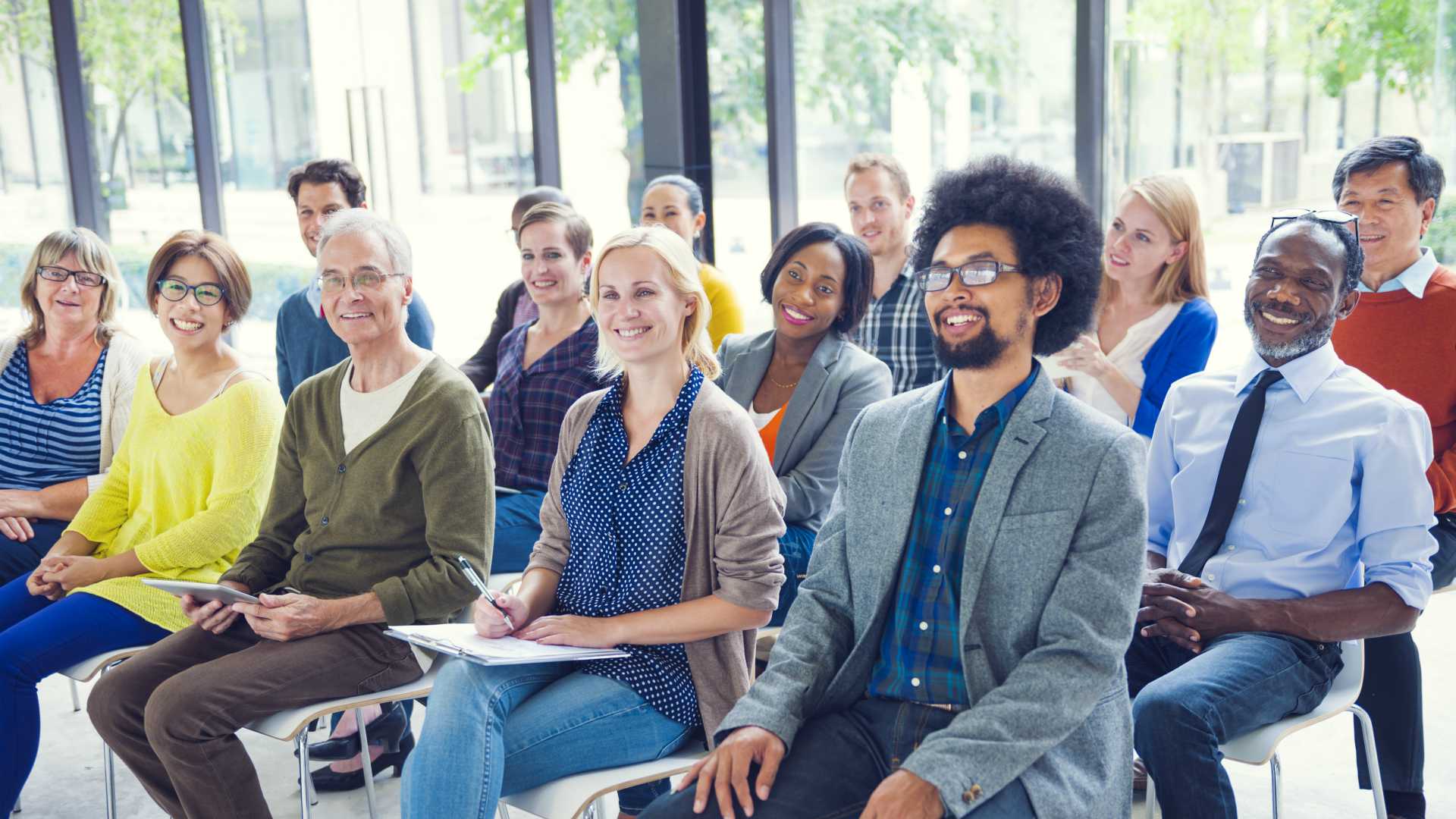 Multi-ethnic group of people in seminar