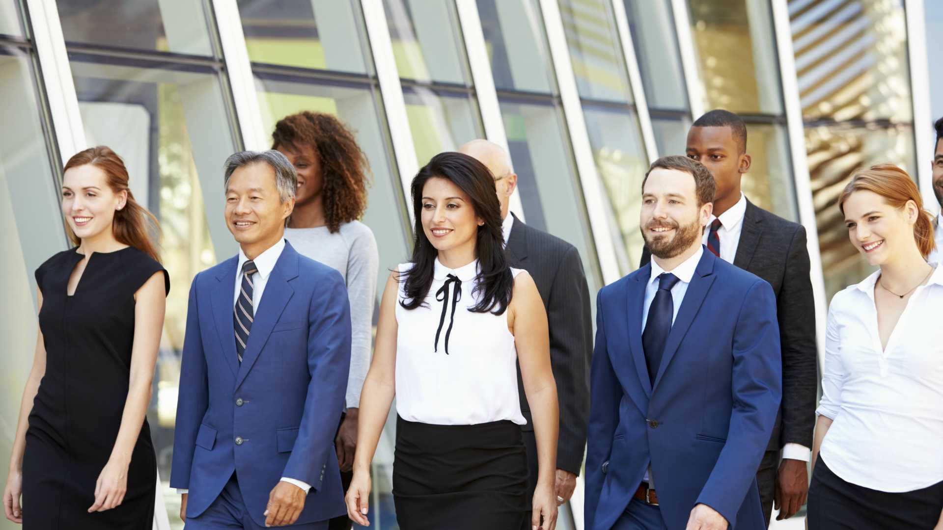 Diverse workforce walking together to board meeting