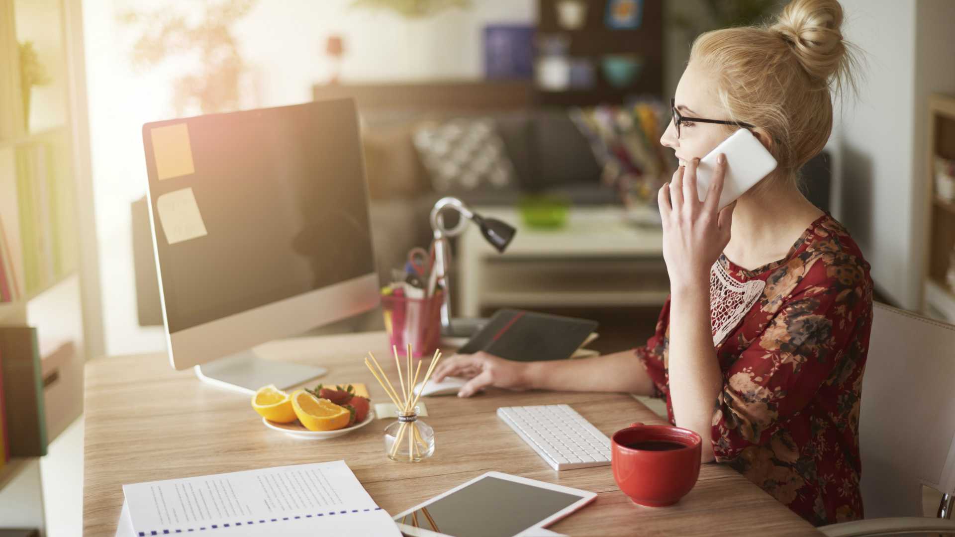 Woman in surroundings of digital technology