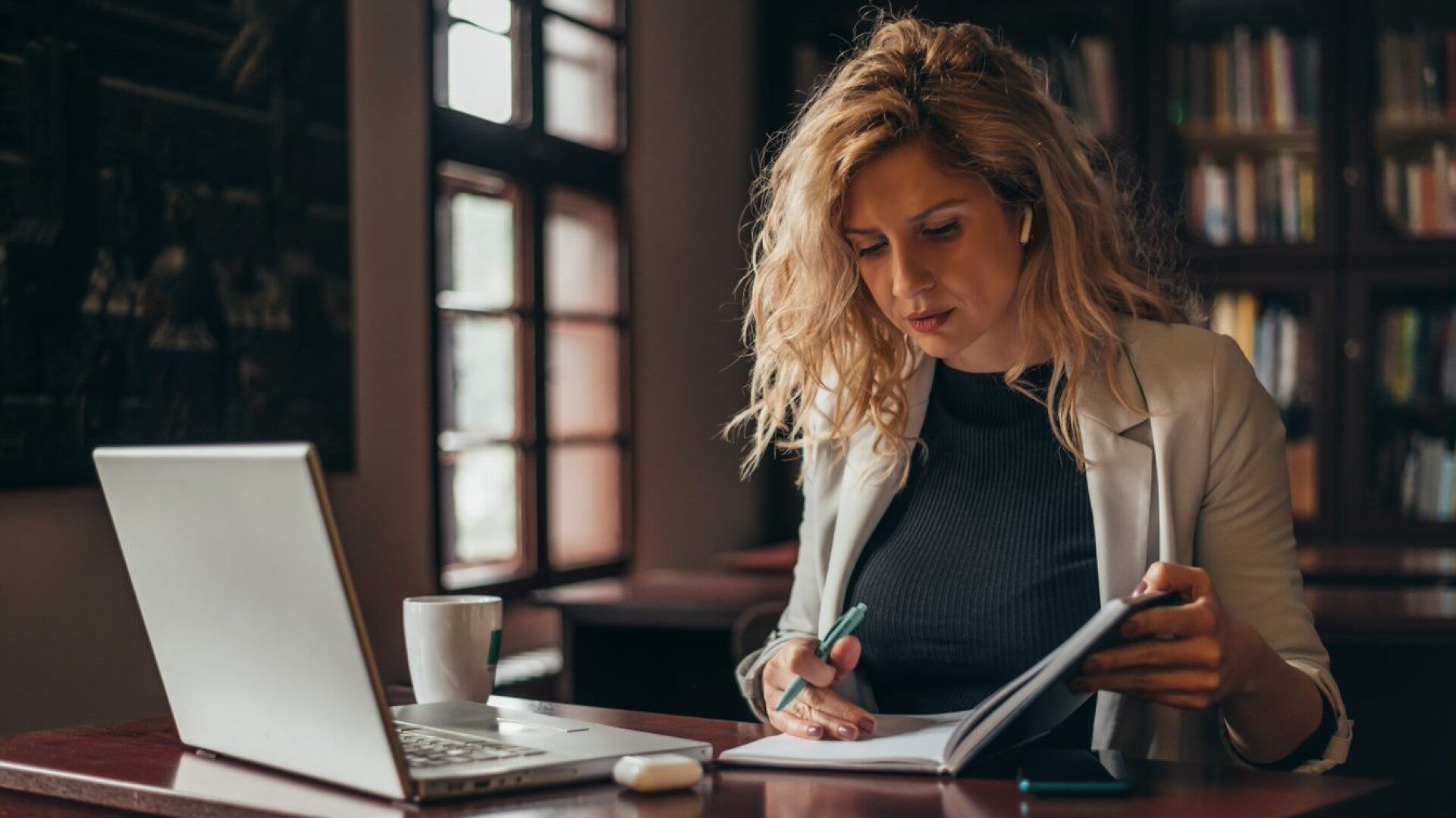 Lady working in library
