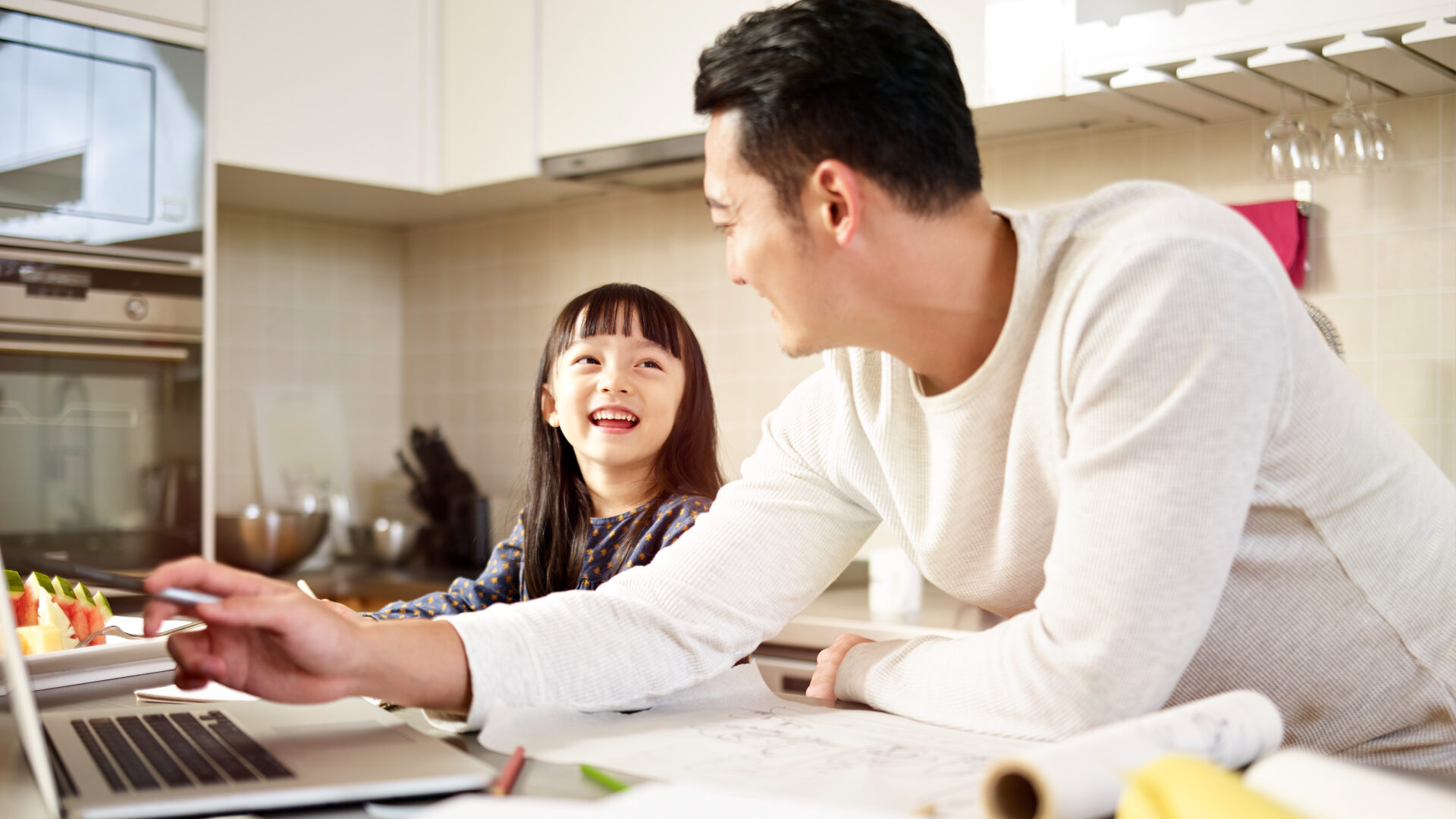 Dad and daughter in the kitchen