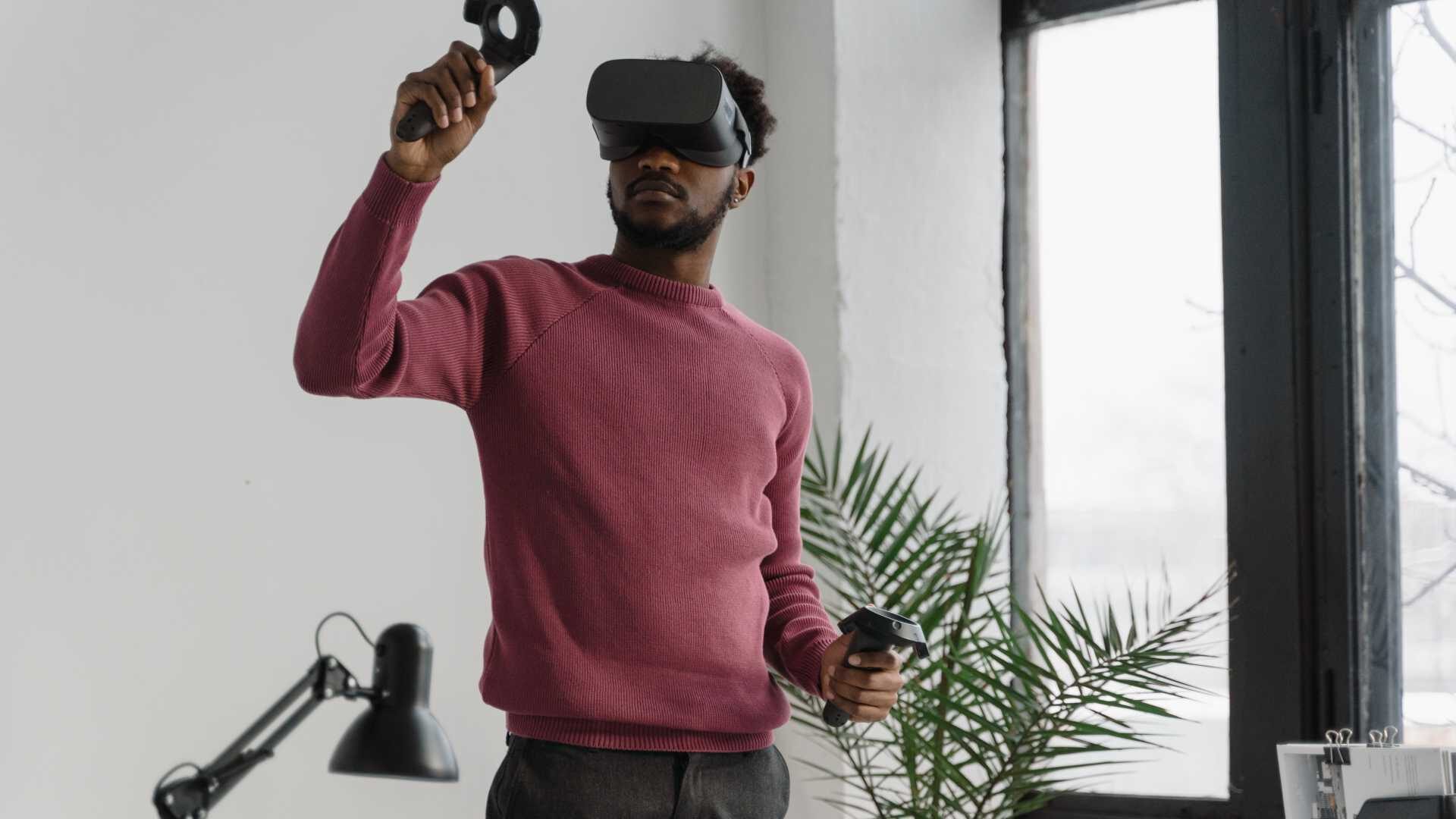A man uses a VR headset