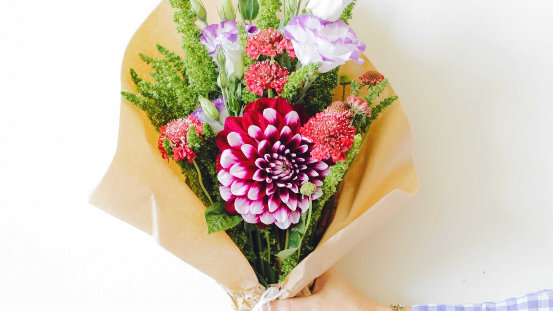 a floral bouquet set against a white background