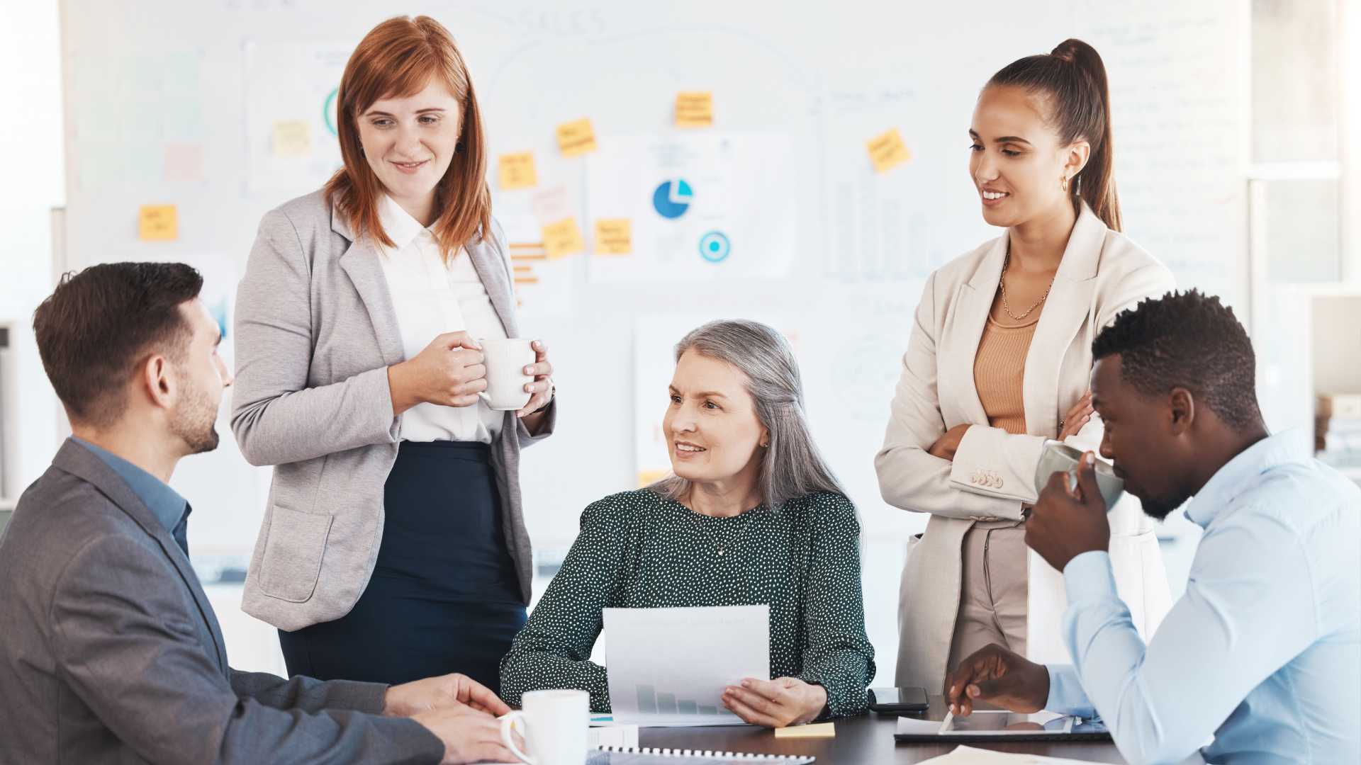 A team of colleagues collaborates in an office space