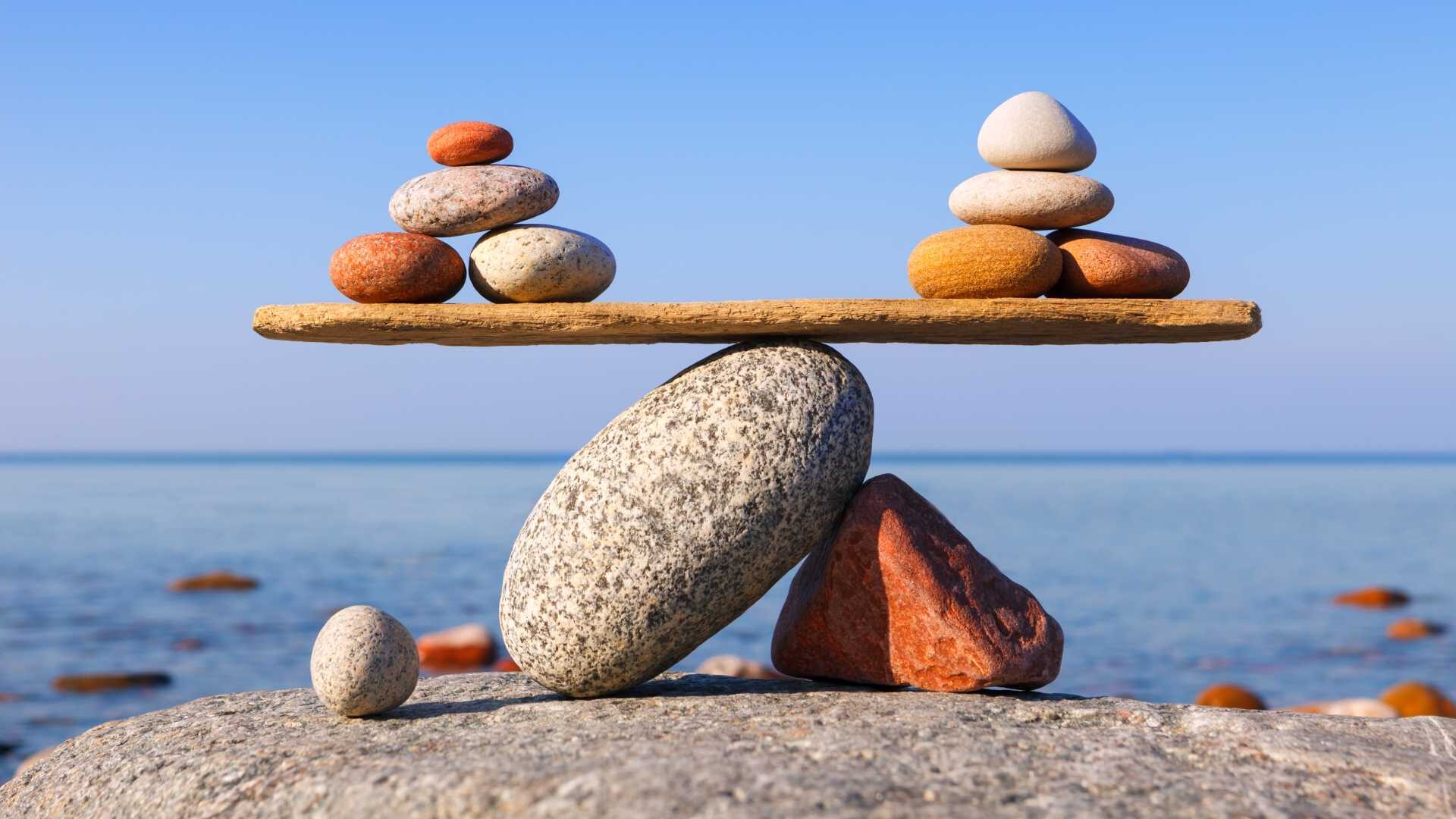 Rocks balance on a scale