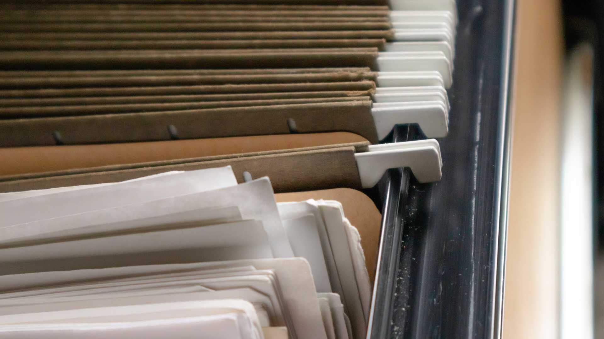 File cabinet with documents.