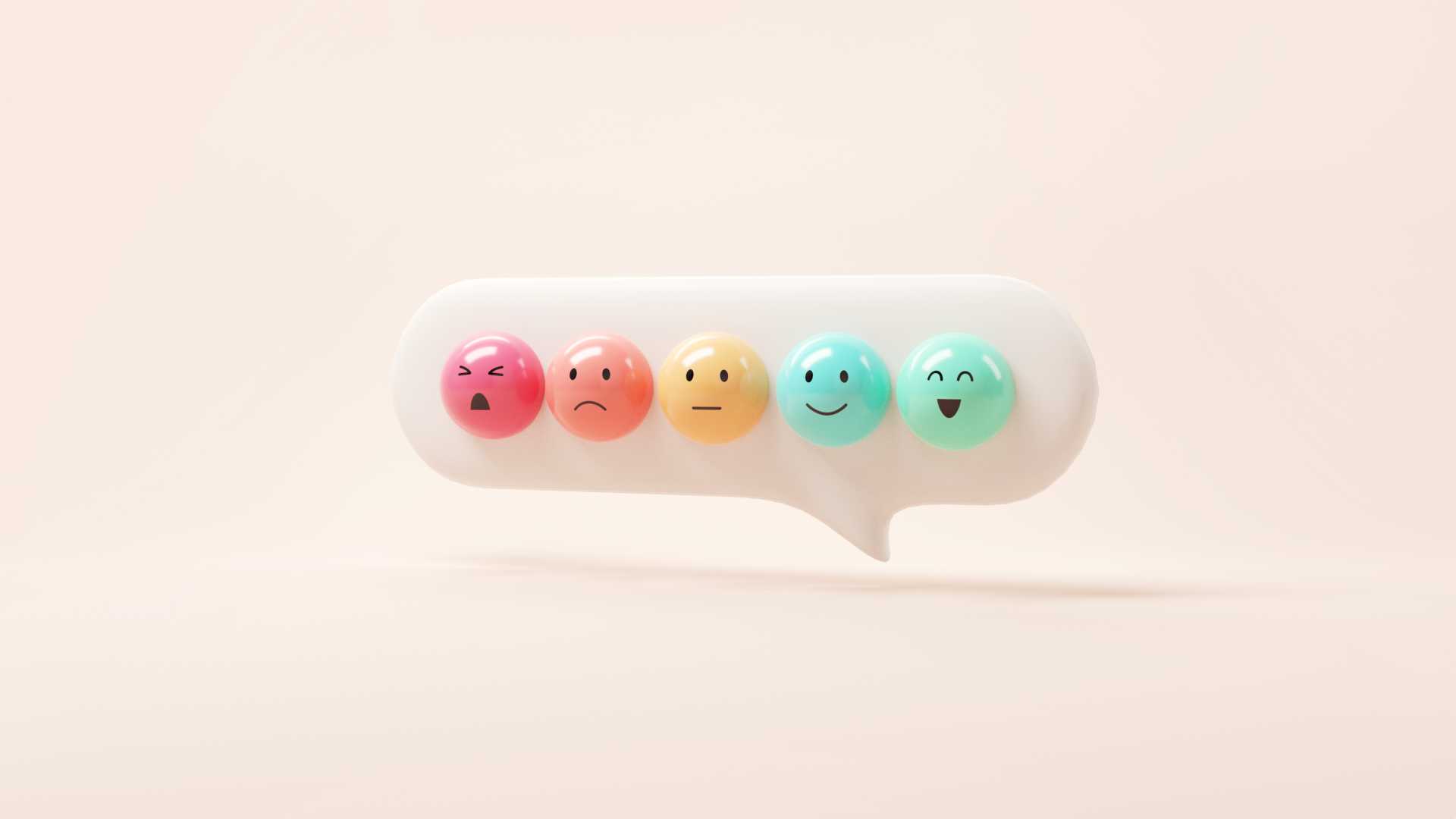 A graphic of five smiley icons in a speech bubble - each one reflects a different emotion