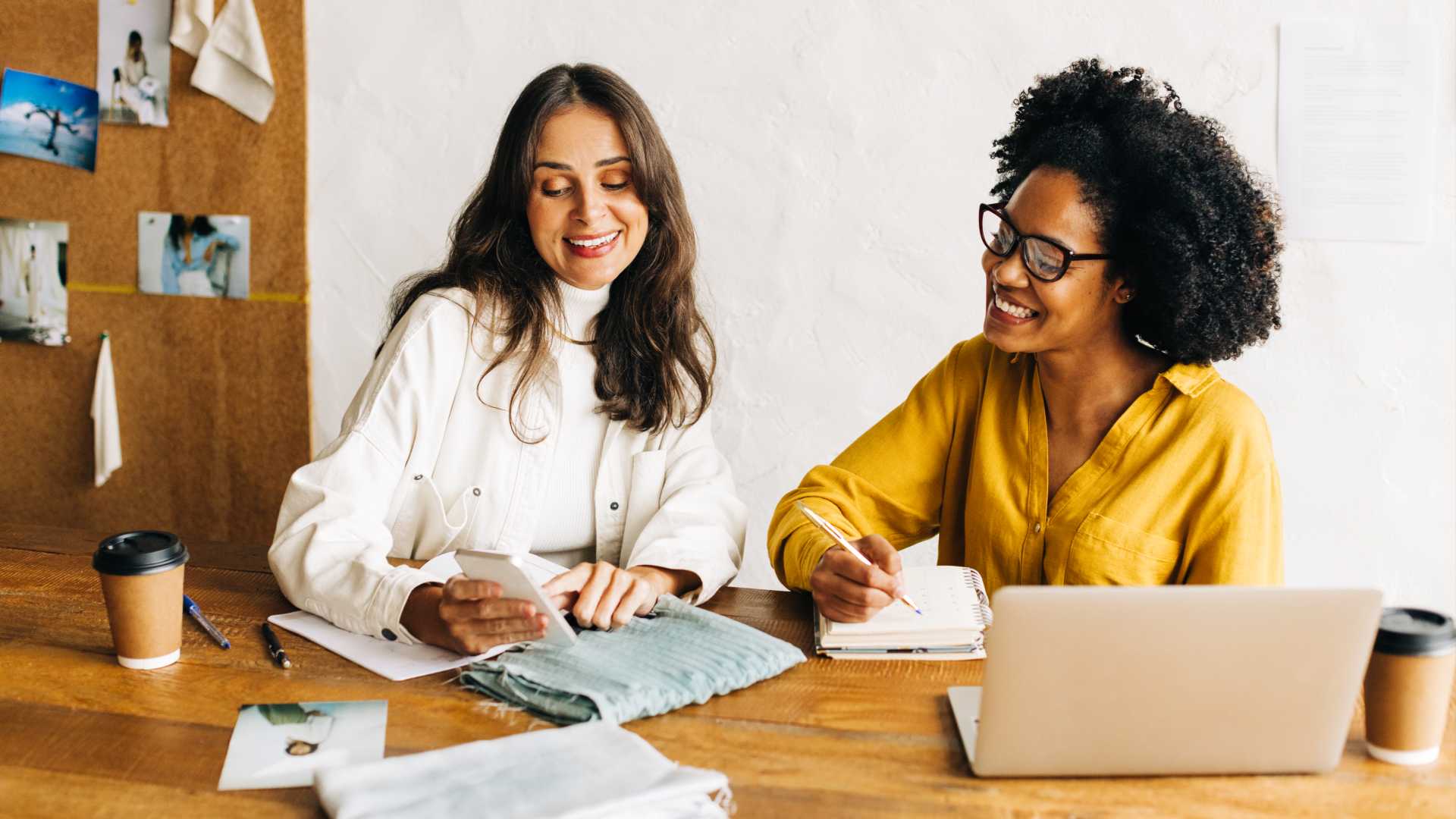 A leader and a direct report communicate in the workplace