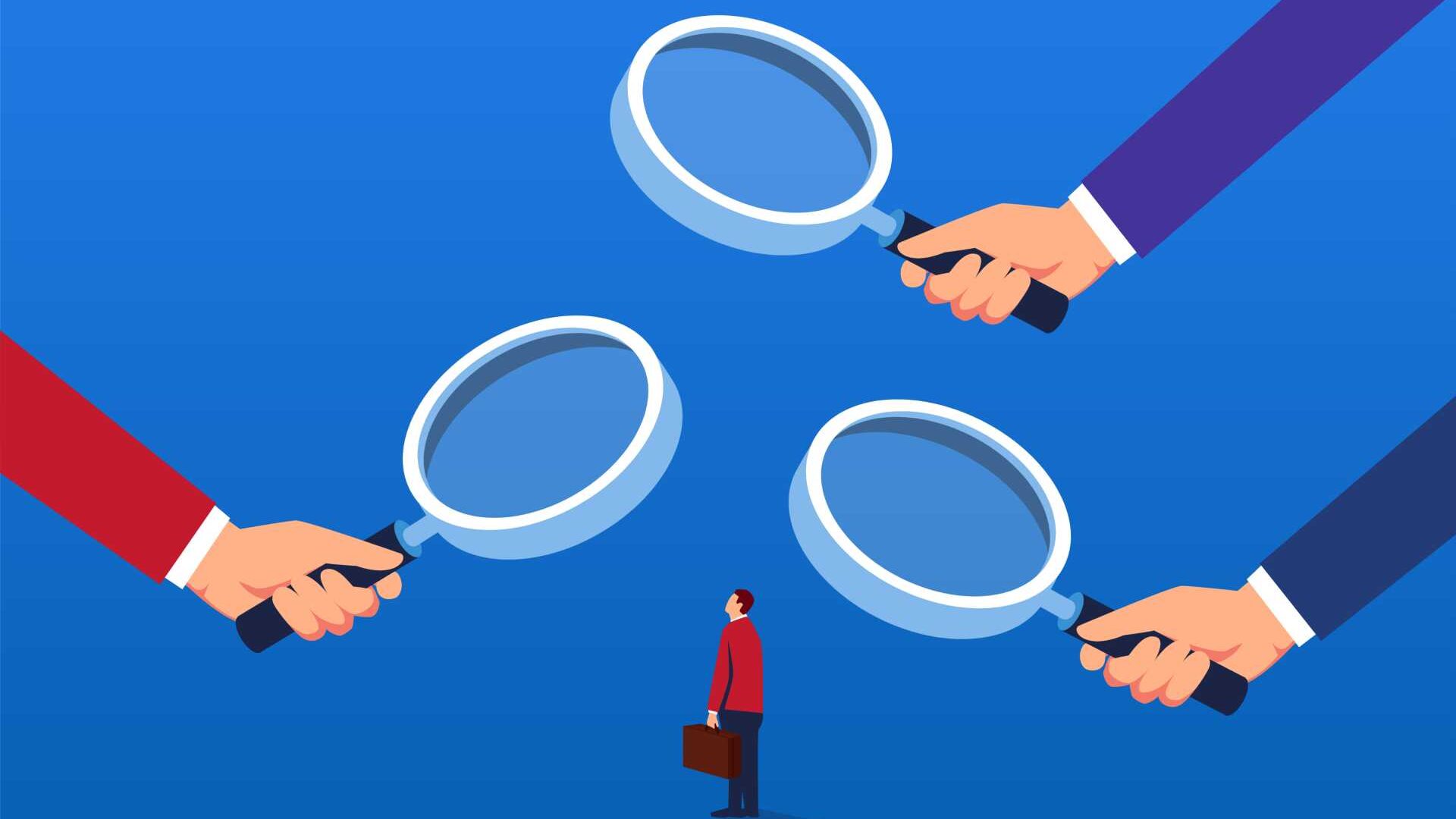 A graphic image of a businessman viewed under a magnifying glass