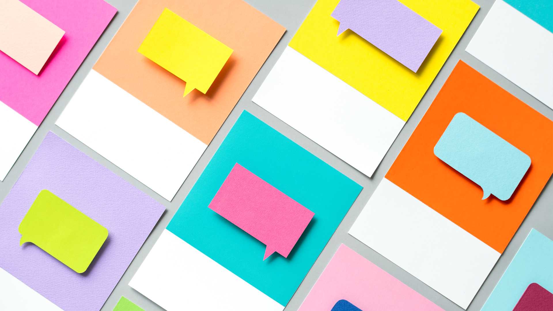 Postcards in color in background.